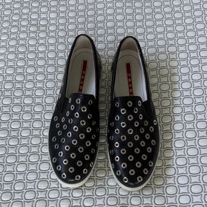 Prada Black Slip-On Loafers with Silver Accents